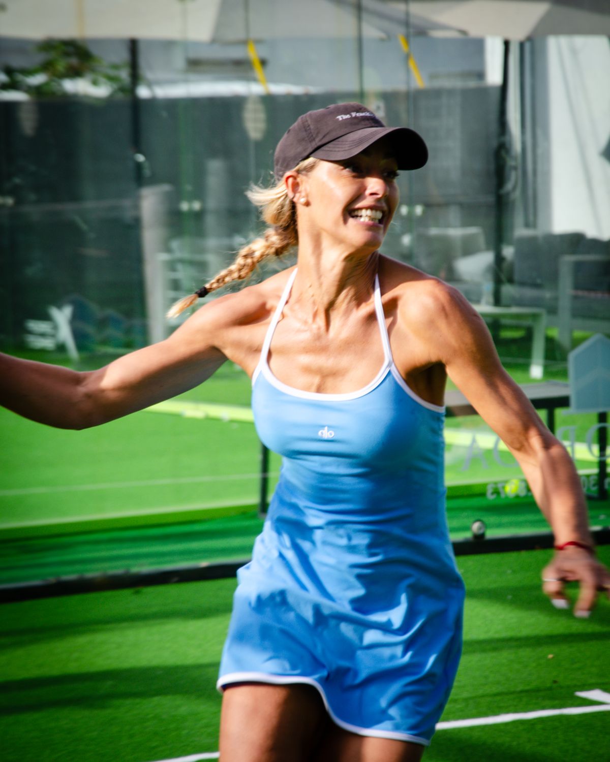 Player smiling mid-match